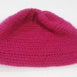 Two knit hats - one large pink hat, one small off white hat with brown flower